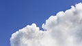 A big and fluffy cumulonimbus cloud in the blue sky