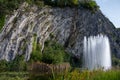 Big fontain by rock, walking in smallest medieval town in world Durbuy on river Ourthe, Ardennen, Belgium Royalty Free Stock Photo