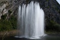 Big fontain by rock, walking in smallest medieval town in world Durbuy on river Ourthe, Ardennen, Belgium Royalty Free Stock Photo