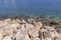 Big foreground of sea stone and blue sea background at Greece Royalty Free Stock Photo