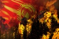 Big forest fire fight concept, natural disaster - flaming fire in the trees on Kyrgyzstan flag background - 3D illustration of