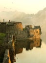 The big fort battlement and large wall at vellore fort with sunset