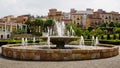 Big fountain with nice houses Tuscany Style and beautiful park Royalty Free Stock Photo