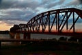 Big Four Bridge crossing the Ohio River at sunset with a cloudy sky in the background, United States Royalty Free Stock Photo