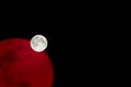 Big full bright dramatic white moon, red reflect Royalty Free Stock Photo