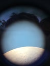 Big full Moon phase with detailed craters on its edges, view through the telescope Royalty Free Stock Photo