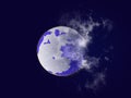 Big full white blue moon silhouette in dark blue cloudy sky. Moon covered with clouds. Moon, sky, cosmos, planets, nature, night.