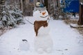 Big funny real Snowman in winter