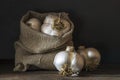 big Garlic Cloves and Bulb wooden table cooking on dark background. burlap sack cutting board copy space Close-up rustic still Royalty Free Stock Photo