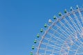 Big giants funfair ferris wheel against blue sky Royalty Free Stock Photo