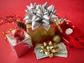 Big gift box with ribbon bow and stack of money, merry chirtmas and happy new year Royalty Free Stock Photo