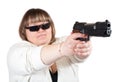 Big girl aiming a black gun Royalty Free Stock Photo