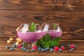 Big glasses with cocktails on a wooden background. Appetizing milkshake with blueberries, mint and peanuts. Copy space. Royalty Free Stock Photo