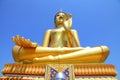 Big gold buddha with blue sky background Royalty Free Stock Photo