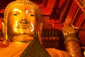 Big gold buddha statue . close up face and head . Wat Phananchoeng temple . symbol of landmark Ayutthaya Thailand place . Royalty Free Stock Photo