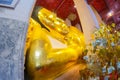 Big gold buddha statue at Wat Phra Non Chaksi, Singburi, Thailand. Beautiful of historic city at buddhism temple