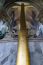 Big gold cross in paris cathedral notre dame