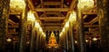 Big golden Buddha statue with beautiful interior architecture