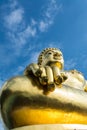 Big golden buddha statue with blue sky at Golden Triangle, Thailand Royalty Free Stock Photo