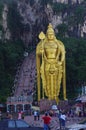 Big golden Buddha statue in front of the religious site of Batu Caves in Malaysia Royalty Free Stock Photo