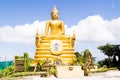 The big golden Buddha statue on hill, Phuket, Thailand. Beautiful golden Buddha inside the temple of popular and largest Bid Royalty Free Stock Photo