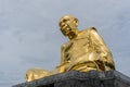 Big Golden image of Luang Pu Tim Isarigo