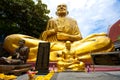 Big golden monk statue