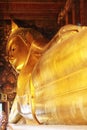 Big golden reclining Buddha image at Wat Pho temple, Thailand Royalty Free Stock Photo