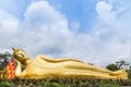 Big golden reclining buddha statue in thai temple Royalty Free Stock Photo