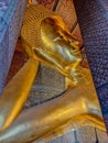 Big golden reclining buddha in the Wat Phra Chetuphon, Wat Pho temple, Bangkok Royalty Free Stock Photo