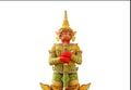 Big golden thai giant statue stand protection in thai temple isolated on white background Royalty Free Stock Photo