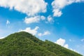Big green mountain lanscape with cloud and blue sky on sunny day Royalty Free Stock Photo