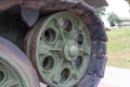 Big green wheel of armored tank