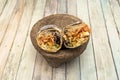 Big grilled chicken burrito inside a gray volcanic stone molcajete Royalty Free Stock Photo