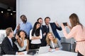 Big Group Of Business People In Office Together, Businesswoman Taking Photo Of Colleagues On Cell Smart Phone, Team Royalty Free Stock Photo