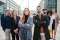 Big group of executive businesspeople posing for a portrait looking at camera at workplace with successful attitude Royalty Free Stock Photo