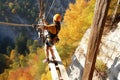 A team of climbers at the top of a high mountain in the light of the setting sun. Royalty Free Stock Photo