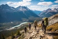 A team of climbers at the top of a high mountain in the light of the setting sun. Royalty Free Stock Photo