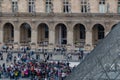 Big group of people outside the Louvre Museum in Paris