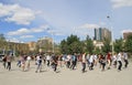 Big group of people is repeating common dance on Royalty Free Stock Photo