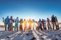 Big group of skiers and snowboarders at sunset mountain Royalty Free Stock Photo