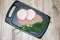 Big group of thinly sliced meat decorated with parsley and dill Royalty Free Stock Photo