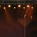 Big Hanukia is on the scene. Hanukkah holiday. Royalty Free Stock Photo