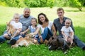 Big happy family with dogs and cat Royalty Free Stock Photo