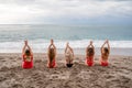 Big happy family or group of five friends is having fun against sunset beach. Beach holidays concept. Royalty Free Stock Photo