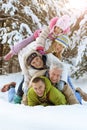 Big happy family having fun in winter park covered with snow Royalty Free Stock Photo