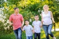 Big happy family walking in the beautiful park Royalty Free Stock Photo