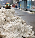 Big heap of snow during cleaning of the street Royalty Free Stock Photo