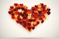 Big heart made of small red and yellow hearts on a white background, valentine, wedding invitation Royalty Free Stock Photo