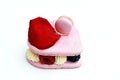 Big heart shape macaron with raspberries, blackberries and butter vanilla cream, decorated with mini macaron and rose petal Royalty Free Stock Photo